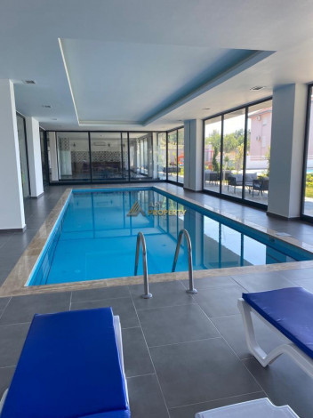 Меблированная квартира планировки 1+1, 58м2 в районе Махмутлар - Ракурс 68