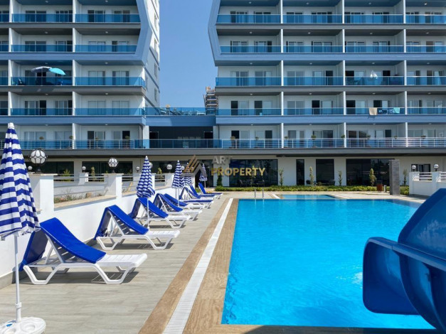 Меблированная квартира планировки 1+1, 58м2 в районе Махмутлар - Ракурс 85