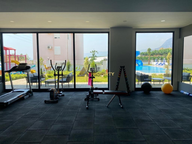 Меблированная квартира планировки 1+1, 58м2 в районе Махмутлар - Ракурс 86