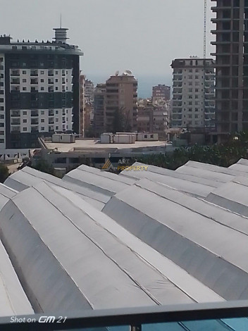 Меблированная квартира планировки 1+1, 58м2 в районе Махмутлар - Ракурс 88