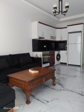 Меблированная квартира планировки 1+1, 58м2 в районе Махмутлар - Ракурс 94