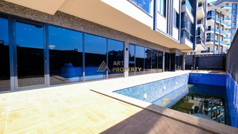 Новая квартира планировки 1+1, 55м2 в жилом комплексе в районе Махмутлар - Ракурс 15