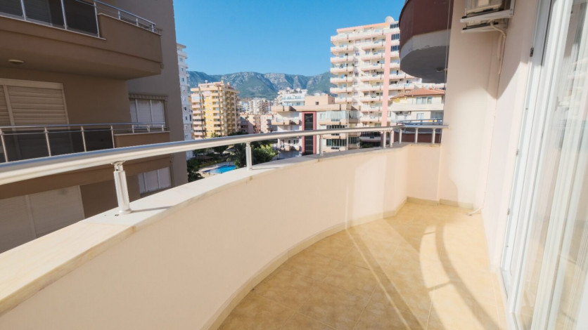 Квартира планировки 1+1 с большой площадью 90м2 в районе Махмутлар - Ракурс 11