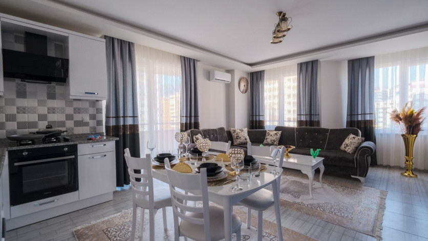 Квартира планировки 1+1 с большой площадью 90м2 в районе Махмутлар - Ракурс 12