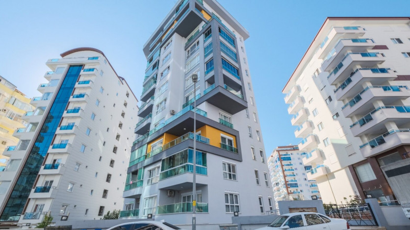 Меблированная квартира планировки 1+1, 70м2 в жилом комплексе, район Махмутлар - Ракурс 11