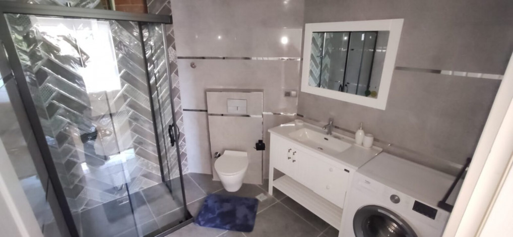 Меблированная квартира планировки 2+1, 110м2 с видом на море и крепость, район Махмутлар - Ракурс 4