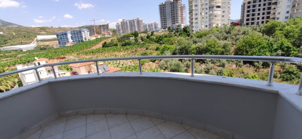 Меблированная квартира планировки 2+1, 110м2 с видом на море и крепость, район Махмутлар - Ракурс 8