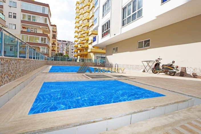 Просторная двухкомнатная квартира рядом с морем в Махмутлар, 75 м2 - Ракурс 16