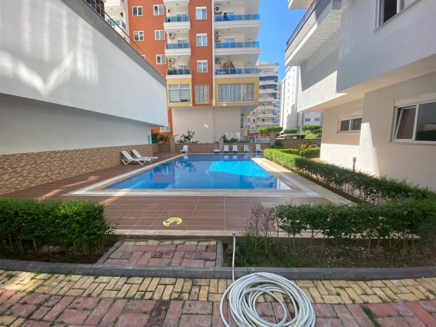 Уютная меблированная квартира планировки 2+1, 115м2 в районе Махмутлар - Ракурс 6