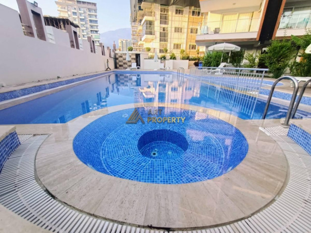 Квартира планировки 1+1, 65м2 с видом на море в уютном жилом комплексе, район Махмутлар - Ракурс 9