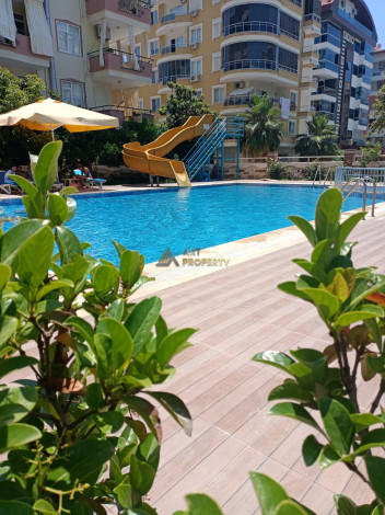 Меблированные апартаменты планировки 2+1, 125м2 в шаговой доступности от моря, Махмутлар - Ракурс 9