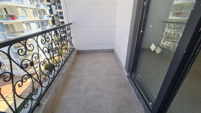 Квартира планировки 1+1, 55м2 в новом жилом комплексе, район Махмутлар - Ракурс 22