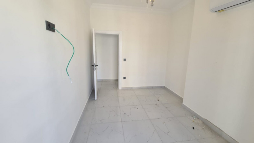 Квартира планировки 1+1, 55м2 в новом жилом комплексе, район Махмутлар - Ракурс 26