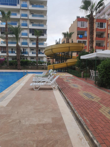 Меблированная квартира планировки 3+1, 140м2 в шаговой доступности от моря, Махмутлар - Ракурс 14