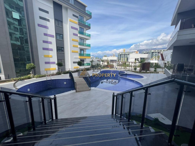 Меблированная квартира планировки 1+1, 55м2 с видом на море и крепость Алании, район Каргыджак - Ракурс 3