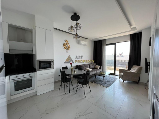 Меблированная квартира планировки 1+1, 55м2 с видом на море и крепость Алании, район Каргыджак - Ракурс 11