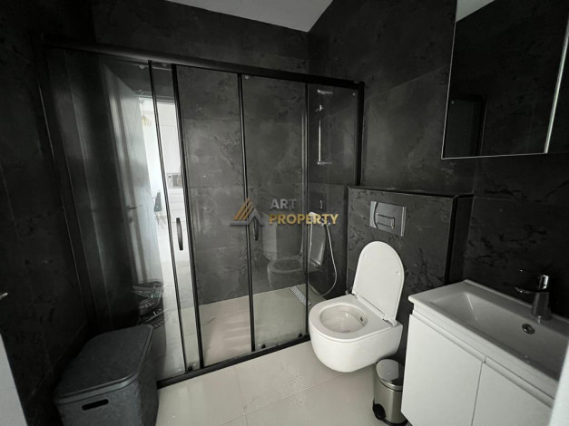 Меблированная квартира планировки 1+1, 55м2 с видом на море и крепость Алании, район Каргыджак - Ракурс 18