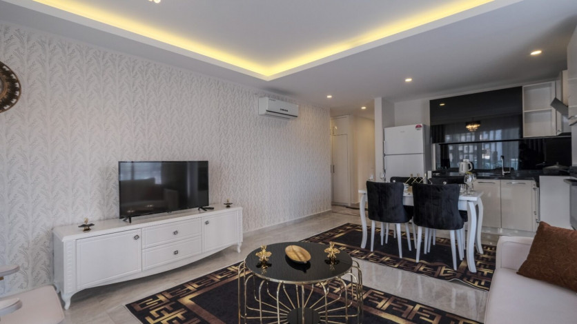 Меблированная квартира планировки 1+1, 70м2 в районе Махмутлар - Ракурс 5