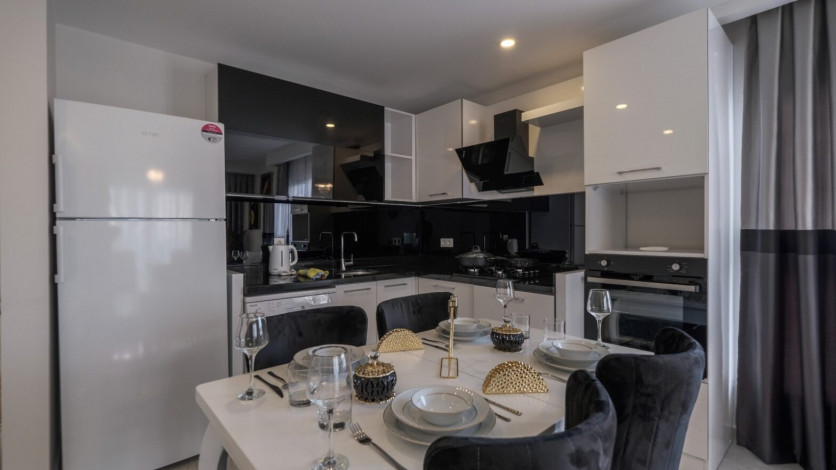 Меблированная квартира планировки 1+1, 70м2 в районе Махмутлар - Ракурс 6