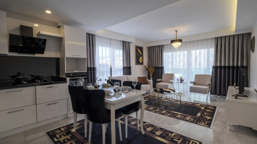 Меблированная квартира планировки 1+1, 70м2 в районе Махмутлар - Ракурс 21