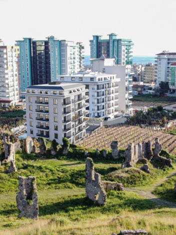 Квартира планировки 1+1, 52м2 с видом на историческое наследие, район Махмутлар - Ракурс 2