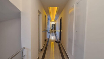 Меблированная квартира планировки 1+1, 70м2 в роскошном жилом комплексе, Махмутлар - Ракурс 35