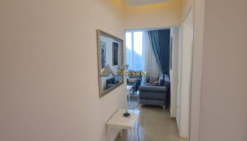 Меблированная квартира планировки 1+1, 70м2 в роскошном жилом комплексе, Махмутлар - Ракурс 37