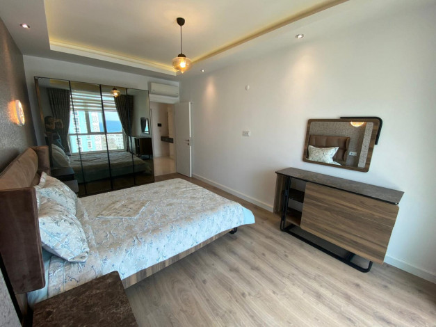 Уютная меблированная квартира планировки 1+1, 75м2 в район Махмутлар - Ракурс 10