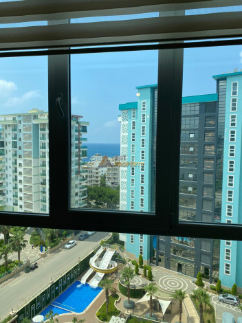 Уютная меблированная квартира планировки 1+1, 75м2 в район Махмутлар - Ракурс 11