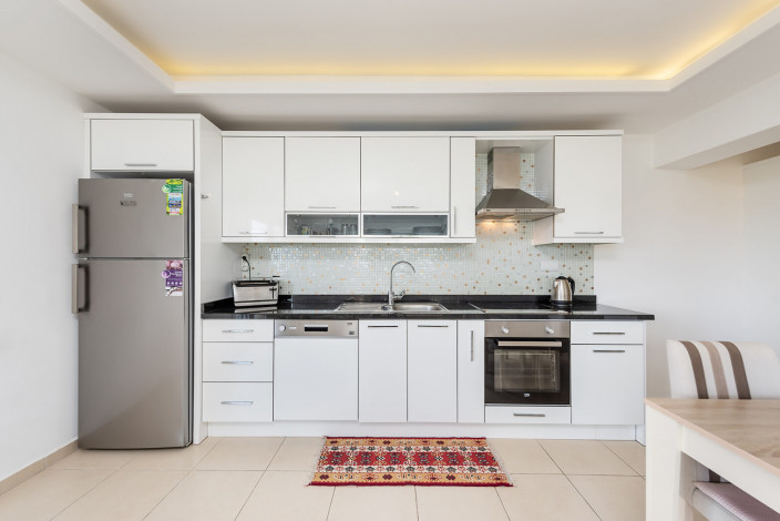 Меблированные апартаменты планировки 1+1, 77м2 в живописном районе Авсаллар - Ракурс 9