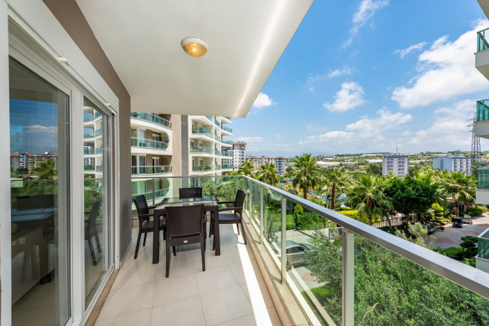 Меблированные апартаменты планировки 1+1, 77м2 в живописном районе Авсаллар - Ракурс 11