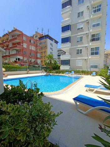 Меблированная квартира планировки 1+1, 65м2 в жилом комплексе, район Махмутлар - Ракурс 4