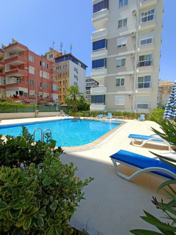 Меблированная квартира планировки 1+1, 65м2 в жилом комплексе, район Махмутлар - Ракурс 7