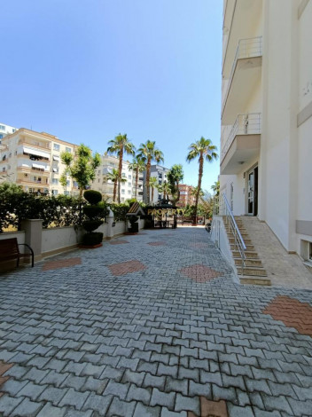 Меблированная квартира планировки 1+1, 65м2 в жилом комплексе, район Махмутлар - Ракурс 8