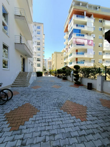 Меблированная квартира планировки 1+1, 65м2 в жилом комплексе, район Махмутлар - Ракурс 10