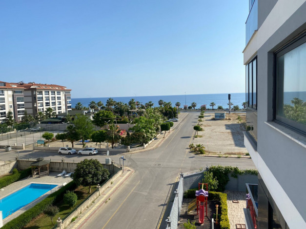 Меблированная квартира планировки 1+1, 80м2 с видом на горы и море, район Кестель - Ракурс 15