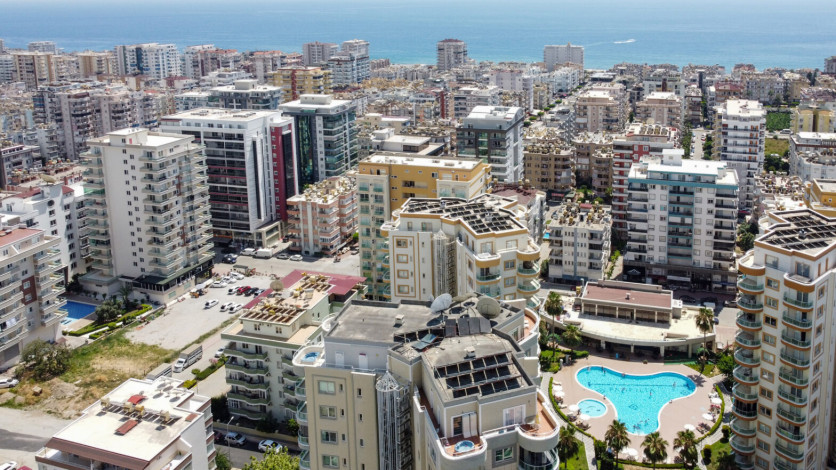 Меблированная квартира планировки 1+1, 60м2 в популярном жилом комплексе, Махмутлар - Ракурс 16