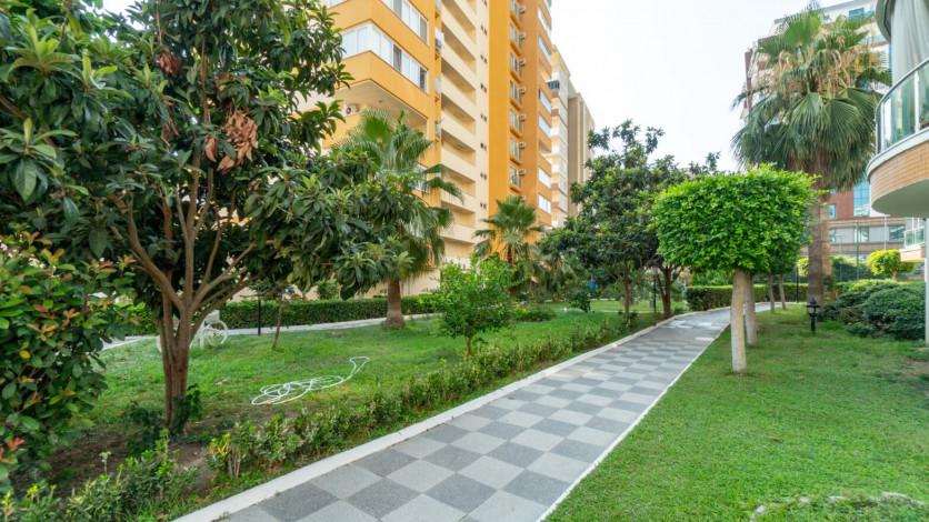 Меблированная квартира планировки 1+1, 60м2 в популярном жилом комплексе, Махмутлар - Ракурс 21