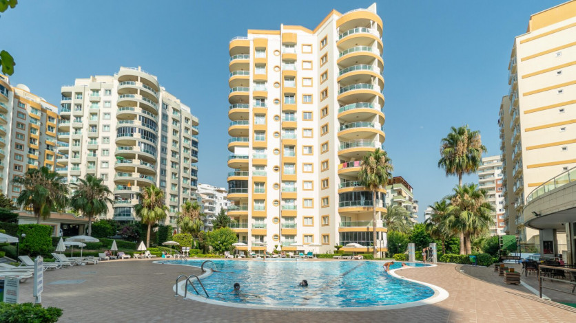 Меблированная квартира планировки 1+1, 60м2 в популярном жилом комплексе, Махмутлар - Ракурс 22