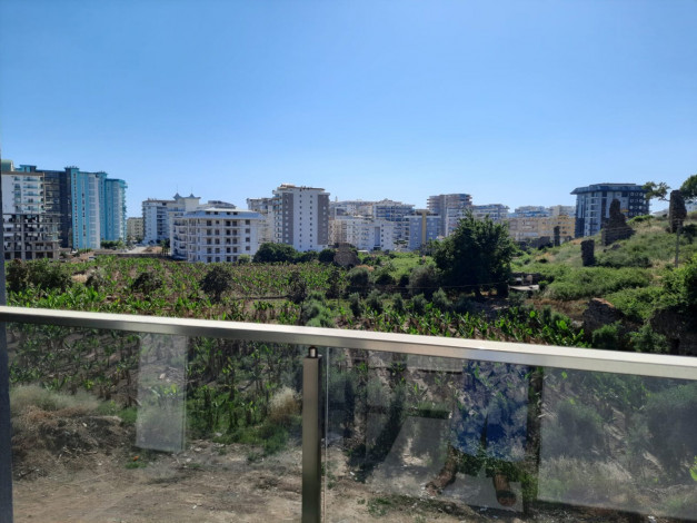 Новая меблированная квартира планировки 1+1, 55м2 с видом на древний город Наула, Махмутлар - Ракурс 4