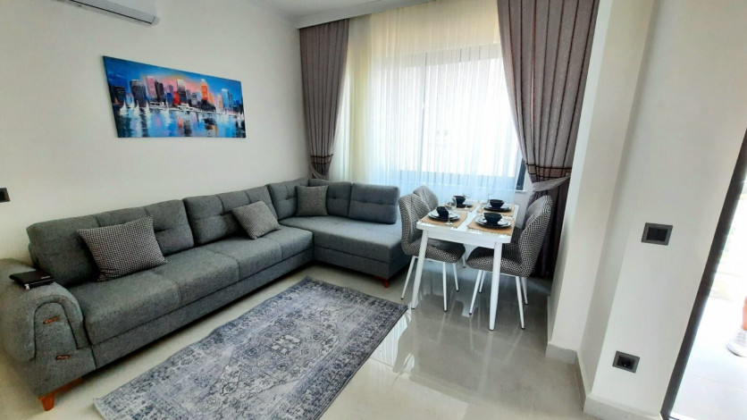 Новая меблированная квартира планировки 1+1, 55м2 с видом на древний город Наула, Махмутлар - Ракурс 5