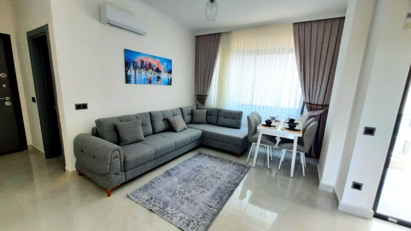 Новая меблированная квартира планировки 1+1, 55м2 с видом на древний город Наула, Махмутлар - Ракурс 6