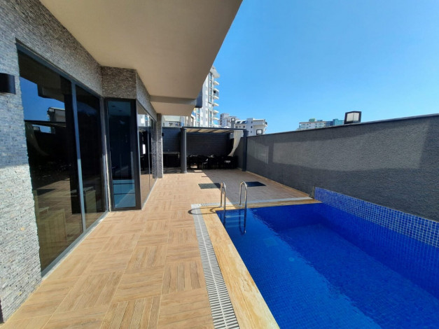 Новая меблированная квартира планировки 1+1, 55м2 с видом на древний город Наула, Махмутлар - Ракурс 12