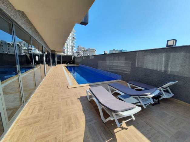 Новая меблированная квартира планировки 1+1, 55м2 с видом на древний город Наула, Махмутлар - Ракурс 14