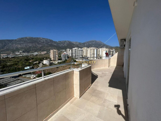 Меблированная квартира планировки 3+1, 210м2 с видом на горы в районе Махмутлар - Ракурс 4