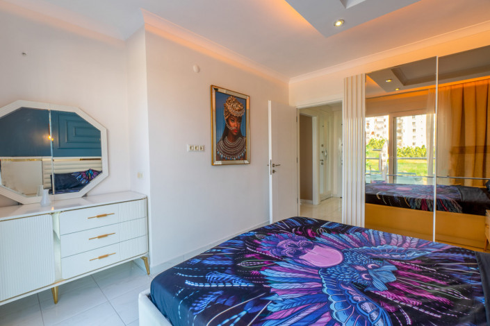 Уютная меблированная квартира планировки 1+1, 55м2 в районе Махмутлар - Ракурс 7