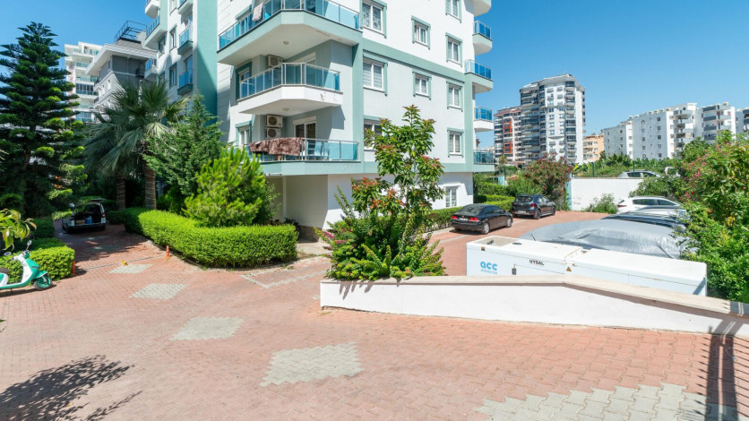 Уютная меблированная квартира планировки 1+1, 55м2 в районе Махмутлар - Ракурс 11