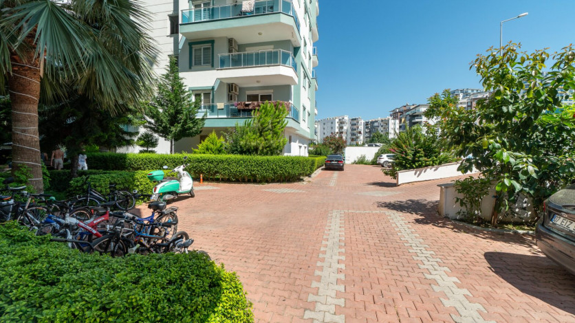 Уютная меблированная квартира планировки 1+1, 55м2 в районе Махмутлар - Ракурс 12