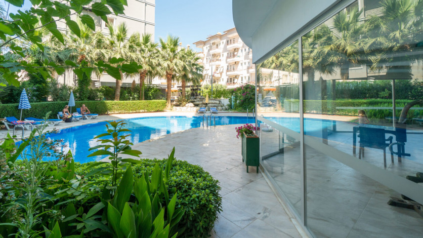 Уютная меблированная квартира планировки 1+1, 55м2 в районе Махмутлар - Ракурс 15