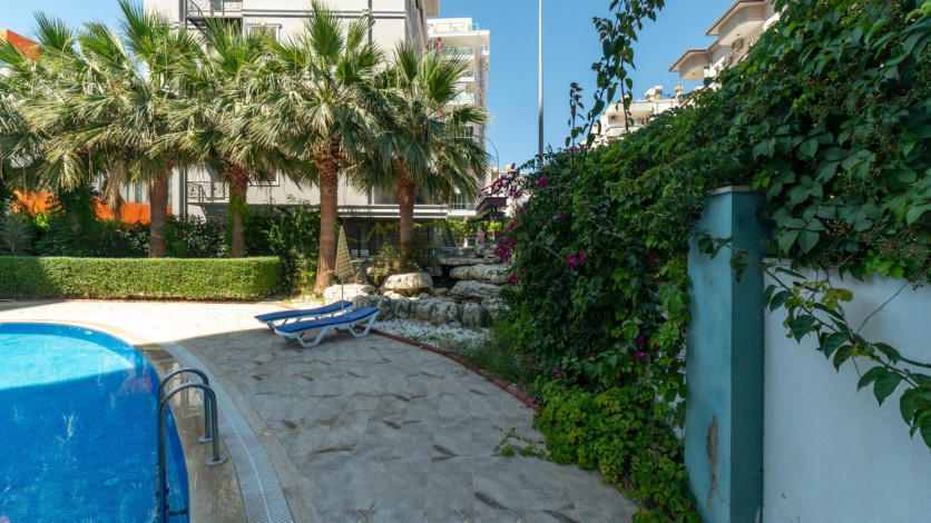 Уютная меблированная квартира планировки 1+1, 55м2 в районе Махмутлар - Ракурс 16